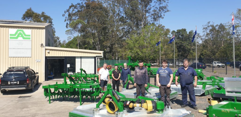 Agrifarm Implements team group photo outside.